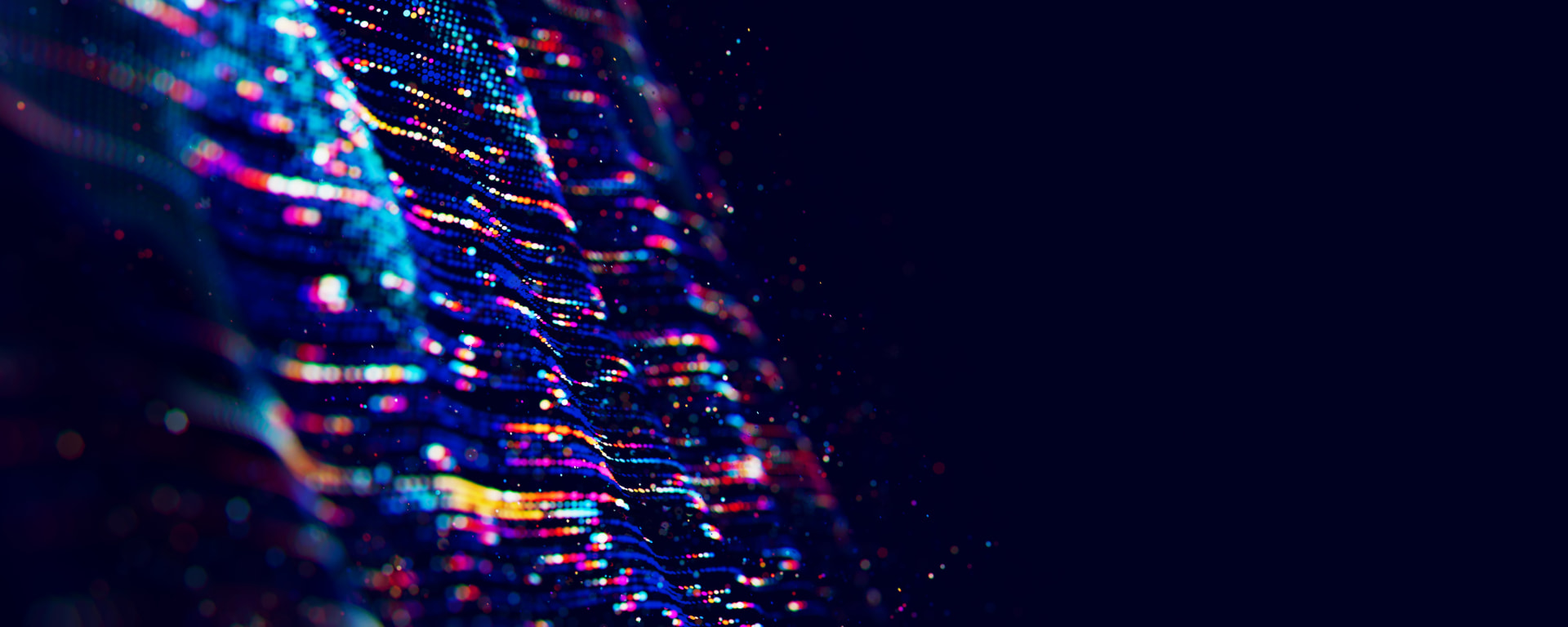 Streams of vivid light moving through depth, suggesting data in motion